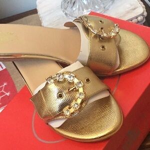 Nicole Griffin. Elegant gold colored slip on shoes/sandals with bling.